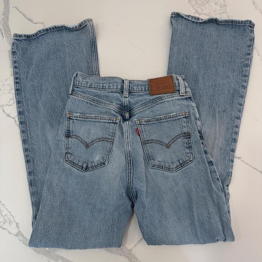 Levi's 70s high waisted flare jeans in light blue, size 25